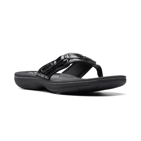 Women's Clarks Breeze Reyna Sandal in black with a sleek toe-post design, offering lightweight comfort and flexible support.