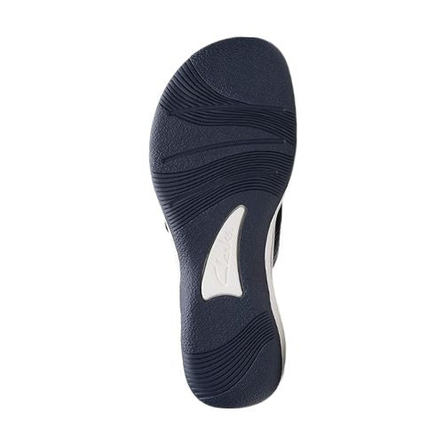 Outsole view of Clarks Breeze Reyna sandal in navy, highlighting the textured rubber sole for enhanced grip and durability.