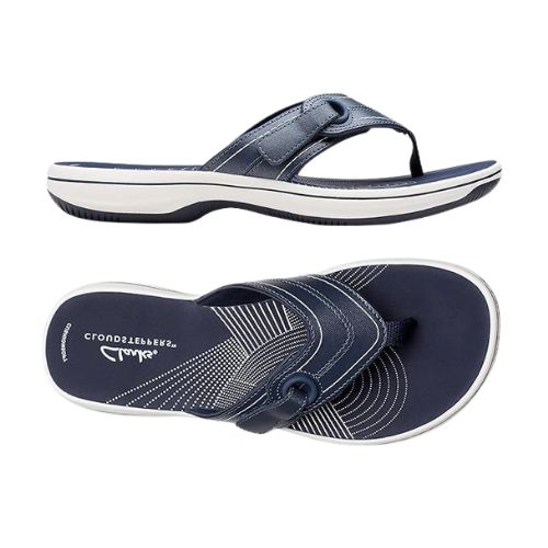 Top and side views of Clarks Breeze Reyna women's flip-flop sandal in navy, showcasing the contoured footbed and adjustable Velcro strap.