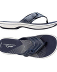 Top and side views of Clarks Breeze Reyna women's flip-flop sandal in navy, showcasing the contoured footbed and adjustable Velcro strap.