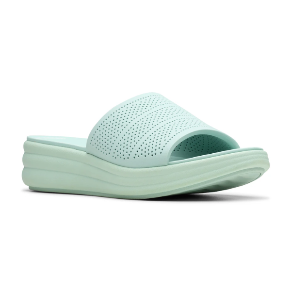 Women's Clarks Drift Twist Slide Sandals in mint green with perforated upper and EVA platform sole for all-day cushioning and support.