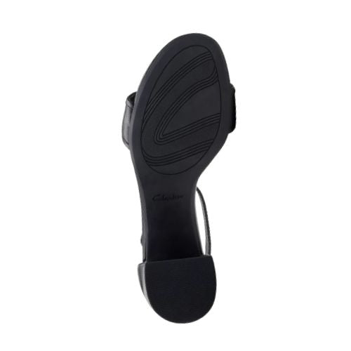 Outsole view of black Clarks Ezoria Mae Heeled Sandal showing textured grip and durable sole, perfect for special occasions.