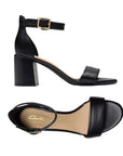 Side and top views of black Clarks Ezoria Mae Heeled Sandal for women, featuring cushioned footbed and elegant wedding-ready design.
