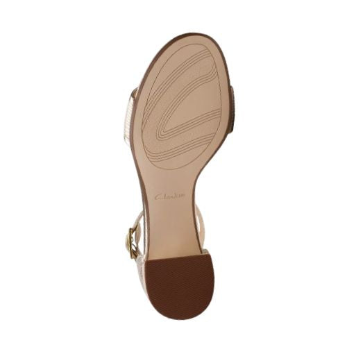 Bottom view of gold Clarks Ezoria Mae Heeled Sandal showing textured sole for grip and comfort, perfect for formal occasions.
