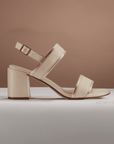 Profile view of Clarks Ezoria Sling Sandal in a studio setting, showcasing elegant leather design and supportive block heel for women.