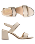 Side and top views of Clarks Ezoria Sling Sandal for women, featuring cushioned footbed and sleek leather straps with metallic trim.
