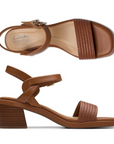 Top and side views of brown Clarks Jaylan Ray Heeled Sandal with cushioned insole and adjustable ankle strap for all-day wear.