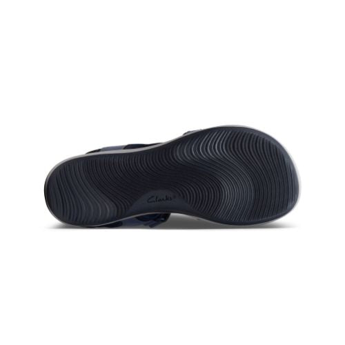Outsole view of Women's Clarks Mira Bay Sport Sandal in blue, featuring textured grip for enhanced traction and stability.