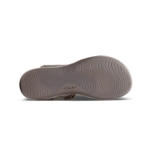 Bottom view of beige Women's Clarks Mira Bay Sport Sandal showing durable, non-slip sole ideal for active use.