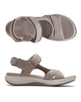 Top and side views of beige Women's Clarks Mira Bay Sport Sandal, designed for flexibility, support, and everyday wear.
