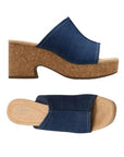 Top and side views of Clarks Nerisa Vine Heeled Sandal in denim blue, featuring textile upper and cushioned footbed.