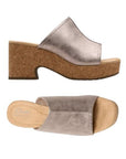 Top and side views of Clarks Nerisa Vine Heeled Sandal in metallic silver, showcasing padded footbed and slip-on design.