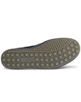 Tan outsole with raised dot pattern tread and Ecco logo stamped at heel.