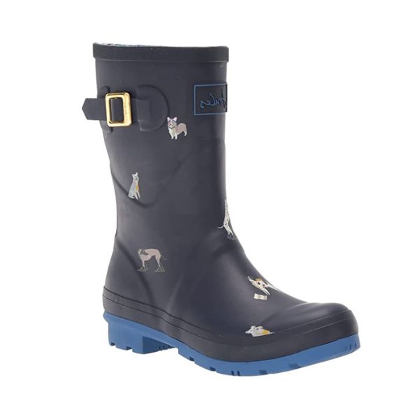 Molly Mid-Height Welly in Navy. Navy blue rubber boot with light blue accents and a light blue outsole. Features a decorative gold buckle. Upper has a painted-on dog pattern.