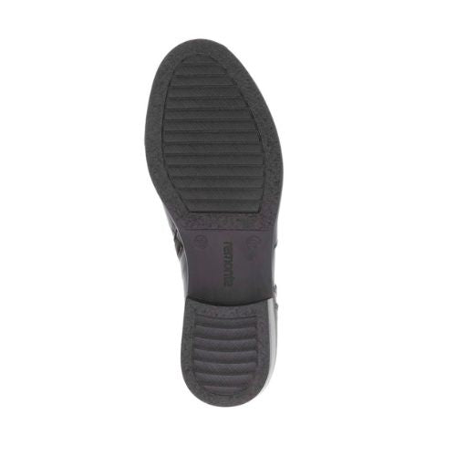 Black light treaded rubber outsole with Remone logo stamped in middle.