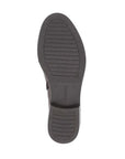 Brown light treaded outsole with Remonte logo stamped in middle.