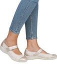 Model wearing Women's Remonte R7627 Mary-Jane Flats with jeans, highlighting stylish fit, bunion-friendly design, and everyday comfort.