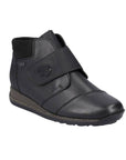 Black Leather Velcro Ankle Boot with accent stitching, brown midsole and black treaded outsole.