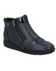 Navy blue ankle boot with a zipper, patent and croco accents and black outsole.
