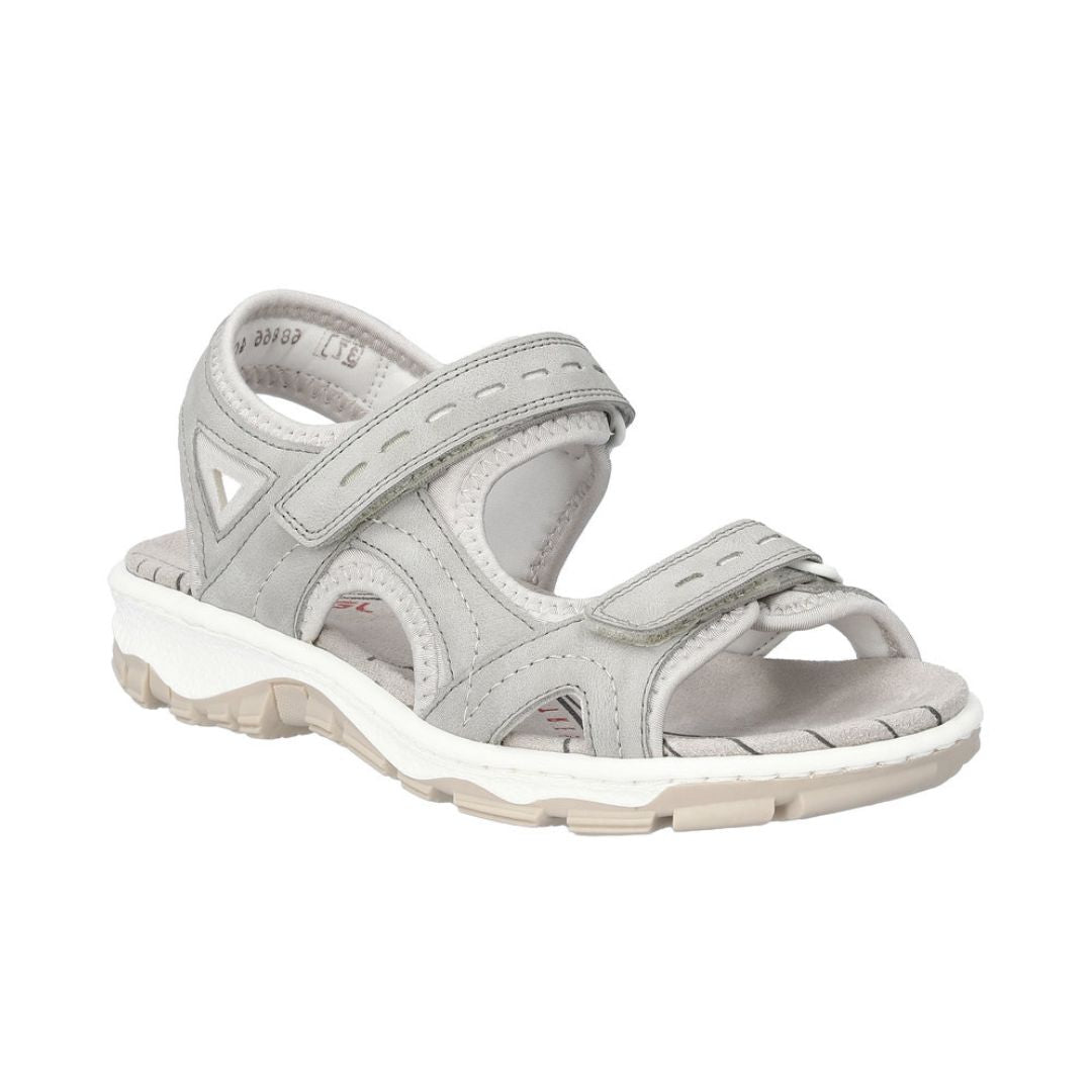 Women's Rieker 68866 Backstrap Sandal in light grey with Velcro straps and cushioned sole, ideal for walking and all-day comfort.