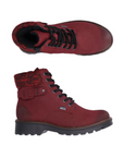 Pair of red combat boots with black laces, knit cuff, and rugged black outsole.