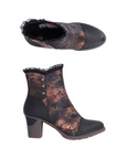 Pair of Women's ankle boot with black toe and heel, with a metallic black and copper marbled upper with floral accents and a ruffled trim.