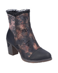 Women's ankle boot with black toe and heel, with a metallic black and copper marbled upper with floral accents and a ruffled trim.