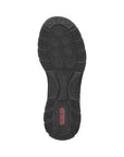 Outsole of a black slip-On sneaker with textured grip and red Rieker logo on heel.