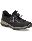 Black slip-on shoe with bungee laces, faux side zipper, Rieker logo in circle side emblem, brown faux cork midsole and a black outsole.