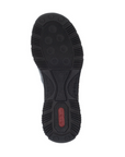 Black light treaded outsole of slip on shoes with red Rieker logo on heel.