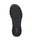 Black light treaded outsole of slip on shoe with red Rieker logo on heel.
