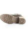 Brown lugged outsole of Mercy boot.