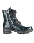 Profile of dark green patent leather combat boot with oversized black lace bow, side zipper and treaded outsole.