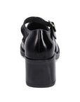 Black patent block heel with silver buckle ankle strap.
