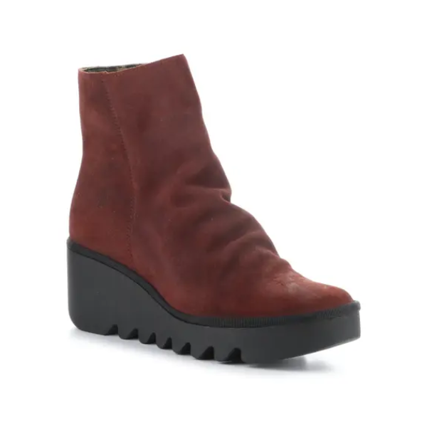 Women's FLY London Baan Wedge Bootie in red suede with 3-inch wedge heel and 1.25-inch platform, ideal for fall fashion and comfort.
