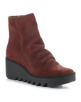 Women's FLY London Baan Wedge Bootie in red suede with 3-inch wedge heel and 1.25-inch platform, ideal for fall fashion and comfort.