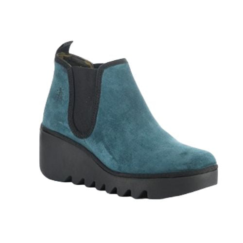 Women's FLY London Byne Wedge Boot in teal suede with black elastic side panels and chunky wedge sole, perfect for stylish seasonal wear.