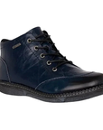 A dark navy blue leather lace-up ankle boot with burnishing details and a black outsole.
