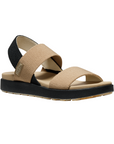 Beige elastic strap sandal with black backstrap and black outsole.