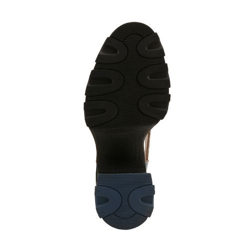 Black Rubber chunky outsole of heeled shoe with blue heel accent rubber.