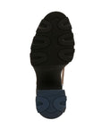 Black Rubber chunky outsole of heeled shoe with blue heel accent rubber.