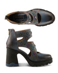Pair of blue leather sculpted chunky block heel shoe with hand-painted floral pattern, cut out accents, 3d floral charms and a zipper at heel.