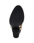 Black light treaded outsole with block heel.