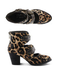 Pair of A leopard print ankle boots with open front, two adjustable vintage metal buckles and a block heel.