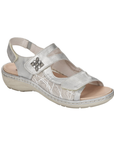 Silver backstrap sandal with 3 adjustable Velcro closures, sparkly square emblem on ankle strap and silver details along side.
