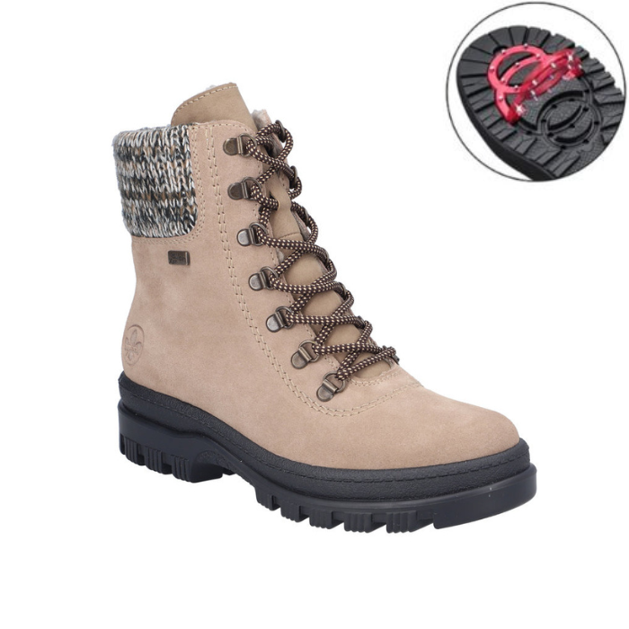 Beige lace up mid boot with grey knit collar, rugged black outsole, and retractable ice cleats.