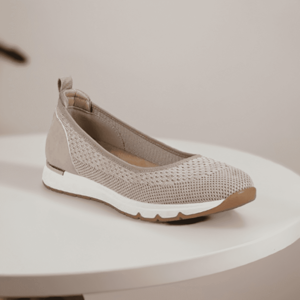 Beige Women's Romiks Naomi 02 Ballet Flat displayed on a white table, highlighting its stylish and comfortable vegan construction.
