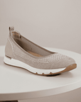 Beige Women's Romiks Naomi 02 Ballet Flat displayed on a white table, highlighting its stylish and comfortable vegan construction.