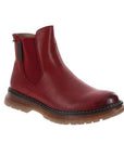 A red Chelsea boot with side goring elastic panel accent tan stitching and a lugged outsole.