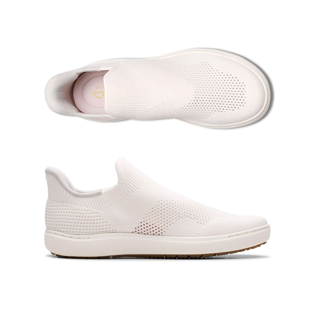 Top and side views of white Clarks Nalle Step Knit Sneaker for women. Features breathable knit upper and easy step-in construction for daily use.